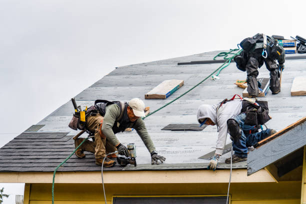 Professional Gutter Installation technician working in Lynn, IN